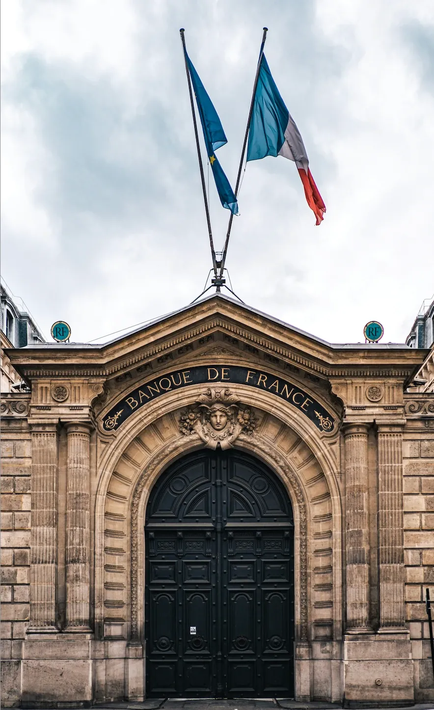 Facade of a grand institutional bank building in Paris